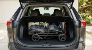 Illustration of a lightweight budget double stroller under $250 folded compactly inside an SUV trunk