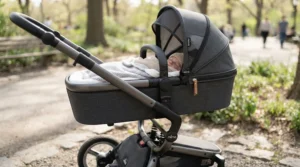 Close-up of the bassinet attachment on a convertible stroller for toddler plus newborn bassinet.